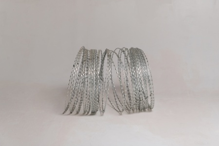 Спиральный барьер безопасности из армированной колючей ленты СББ АКЛ 955/100/5